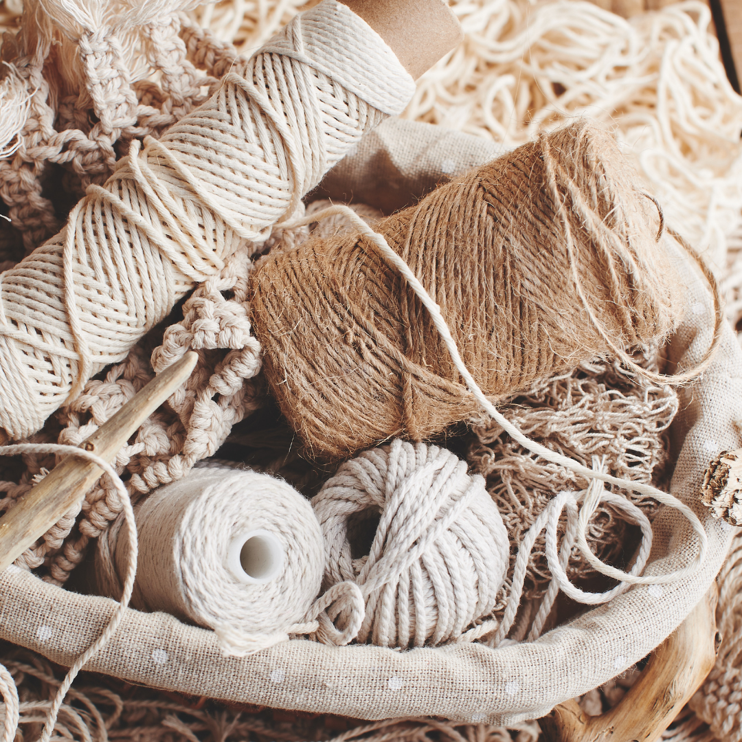 Basket full of macrame cord and accessories